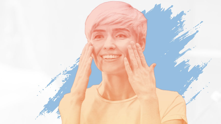Smiling woman with short blonde hair touching her cheeks, for the BelleSkin article The Gentle Face Wash Switch Your Dry Skin Needs After 50