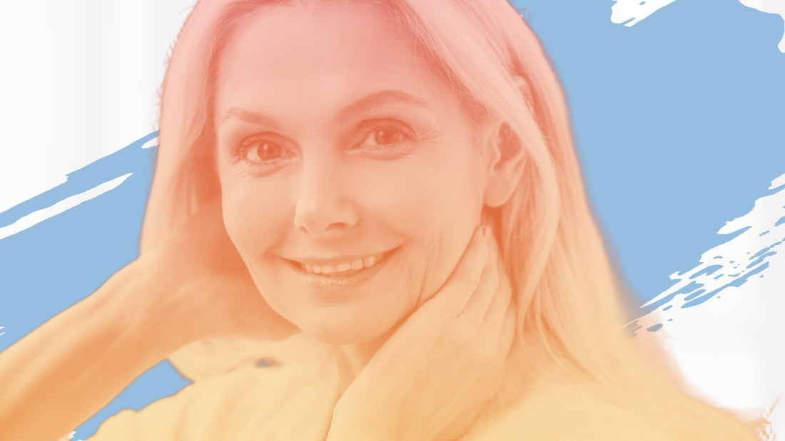 Smiling blonde woman touching her neck, for the BelleSkin article Hydroquinone Explained: What Women Over 40 Should Know First