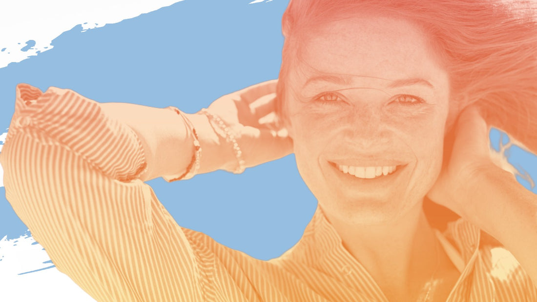 Smiling woman with red hair and freckles, for the BelleSkin article A Pore and Blackhead Routine for Women Over 40